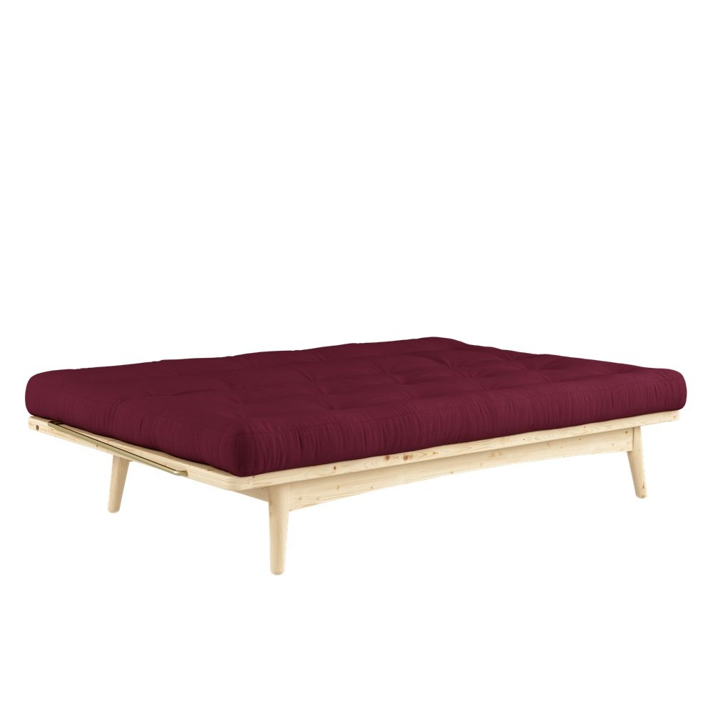 Banquette futon FOLK en pin massif coloris bordeaux couchage 130 x 190 cm.